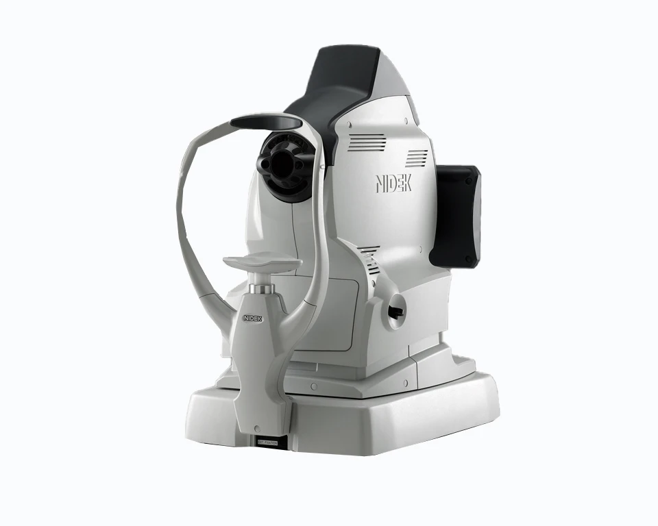 A White, Modern Eye Examination Machine Prominently Displaying The Brand Name &Quot;Nidek&Quot; On Its Side. The Device Features A Chin Rest And Head Stabilizer Along With Various Adjustable Components For Precise Positioning, Making It Ideal For Retinal Imaging Or Other Optometric Procedures.