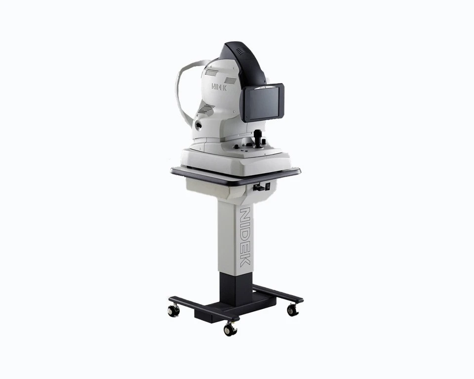 A Nidek Ophthalmic Device, Designed For Eye Examinations, Is Positioned On A Wheeled Stand. The Sophisticated Equipment Features A Monitor, Control Panel, And Various Components For Detailed Eye Assessments. The Stand Prominently Displays The &Quot;Nidek&Quot; Brand Name.