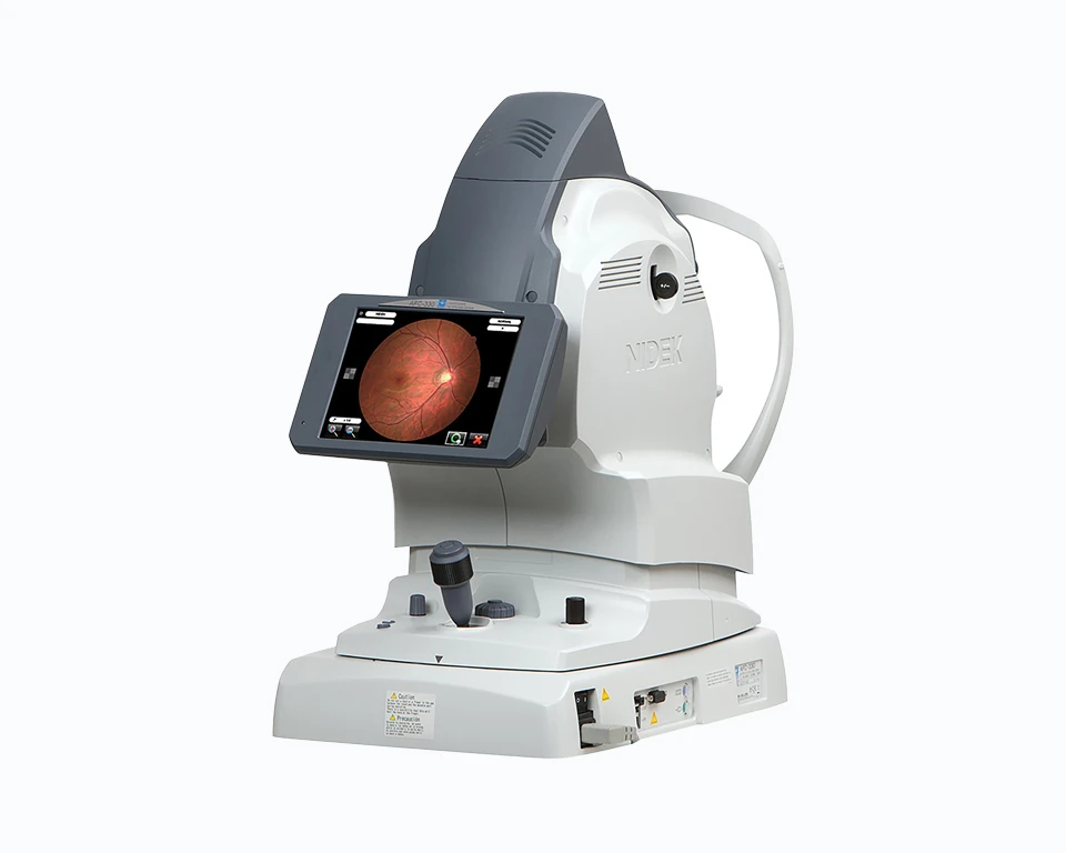 A White And Gray Nidek Ophthalmic Medical Device Designed For Examining Eyes, Featuring A Tiltable Screen Displaying An Image Of An Eye'S Retina. The Device Boasts Buttons, Knobs, And Various Controls, Highlighting Its Advanced Diagnostic Functions.