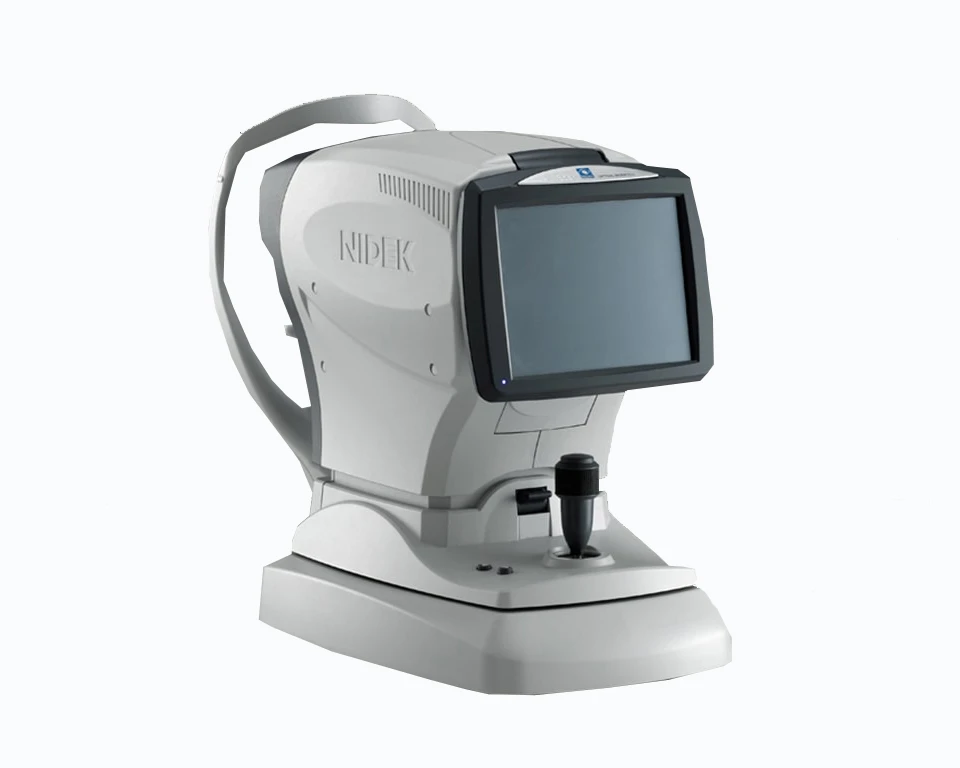 A White Optometry Machine With A Digital Screen And Various Controls Designed For Eye Examinations, The Nidek Device Boasts A Sleek, Modern Design. It Features &Quot;Nidek&Quot; On Its Side And Includes A Small Joystick Below The Screen For Adjustments. Its Ergonomic Shape Is Perfect For Clinical Settings.