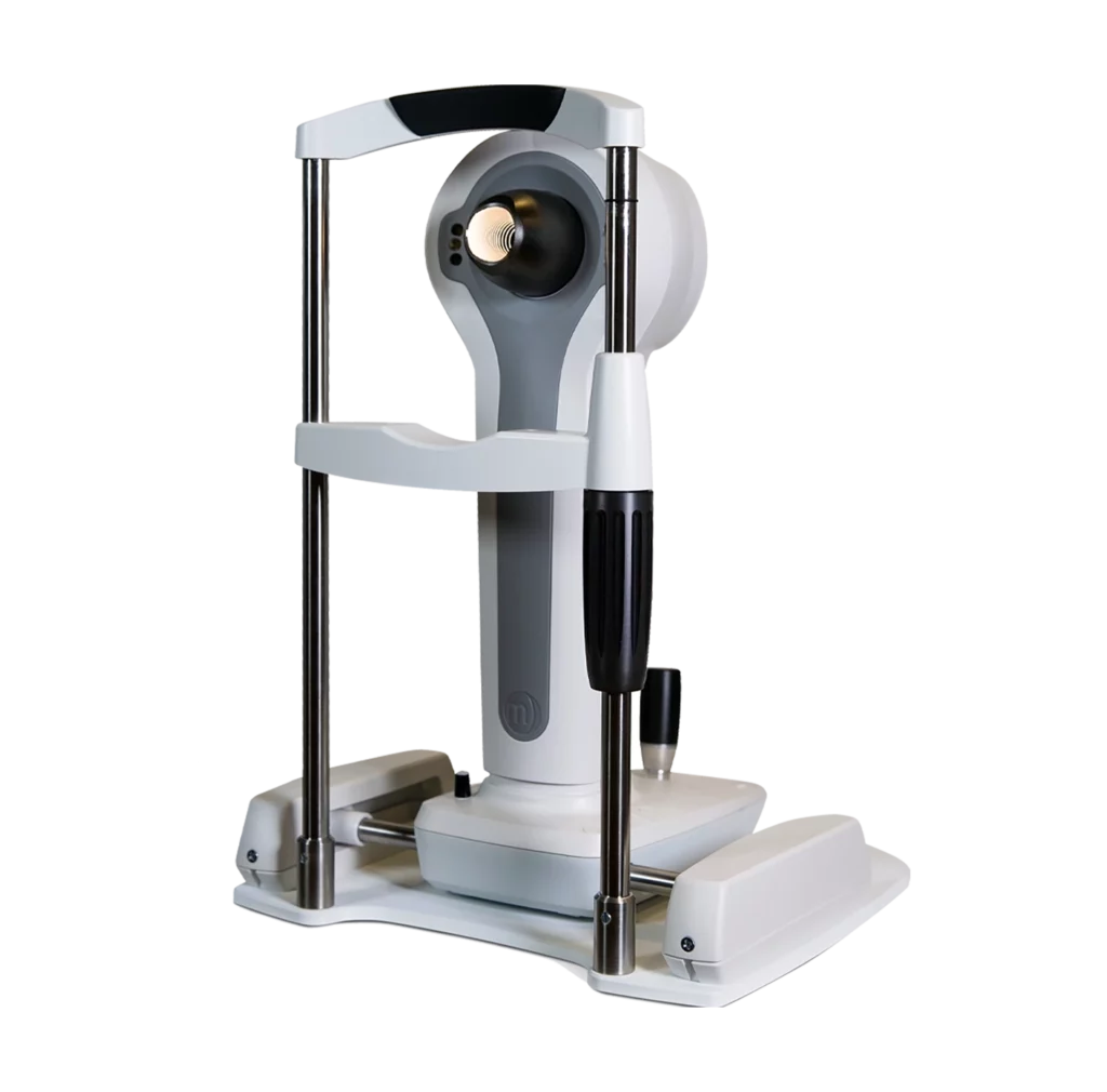 A Modern Ophthalmic Device By Nidek With A Sleek Design Featuring A Gray And White Color Scheme, Two Vertical Metal Rods, And A Central Adjustable Headrest. The Instrument Is Used For Eye Examinations And Measuring Various Aspects Of Eye Health.