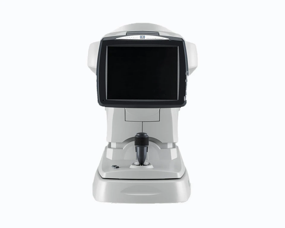 Front View Of A Nidek Eye Examination Device, Featuring A Large Digital Screen, Control Panel, And A Chin Rest. The Device Is Primarily Used For Conducting Comprehensive Eye Tests. The Background Is Plain White.