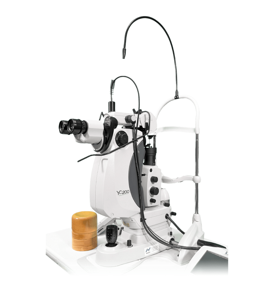 A Medical Device Used In Ophthalmology; A Slit Lamp Biomicroscope With Binocular Eyepieces, A Joystick For Positioning, Knobs And Dials For Adjustments, And An Attached Laser Apparatus, Useful For Detailed Examination And Treatment Of The Eyes.